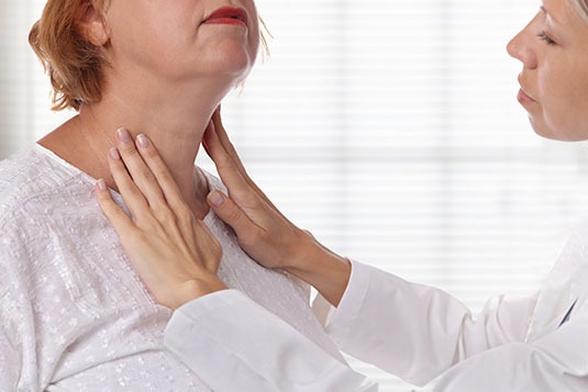 thyroid specialist melbourne doctor observing neck area